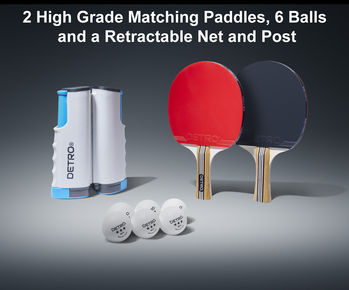 two detro table tennis paddles a retractable net and six balls